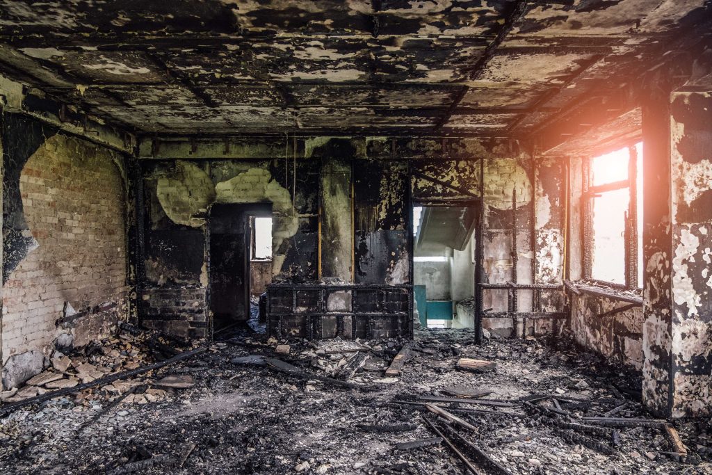 A room is completely destroyed by a fire in a — home.